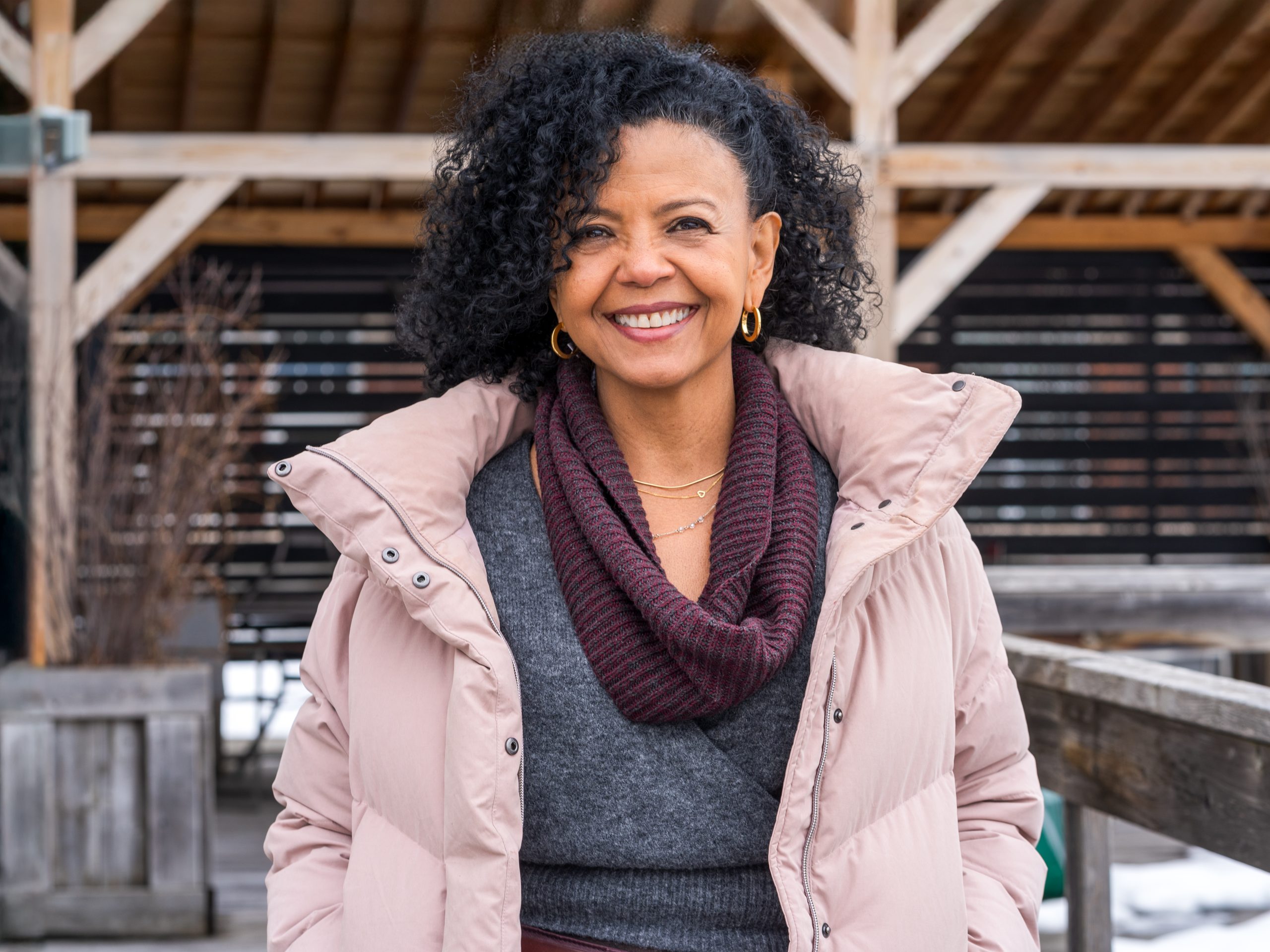 A photo of Katya Tunon outside, smiling at the camera.